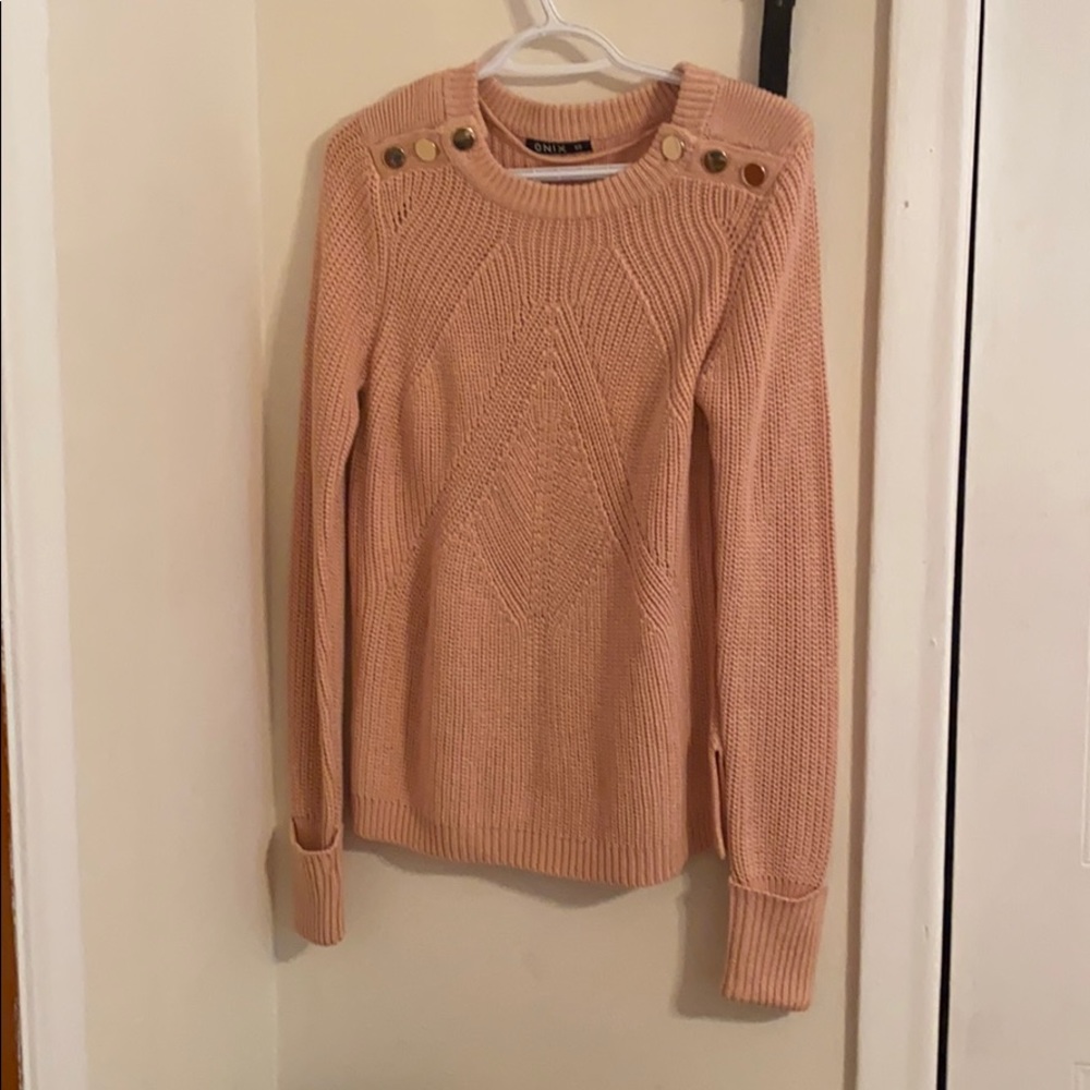 Pink knitted sweater